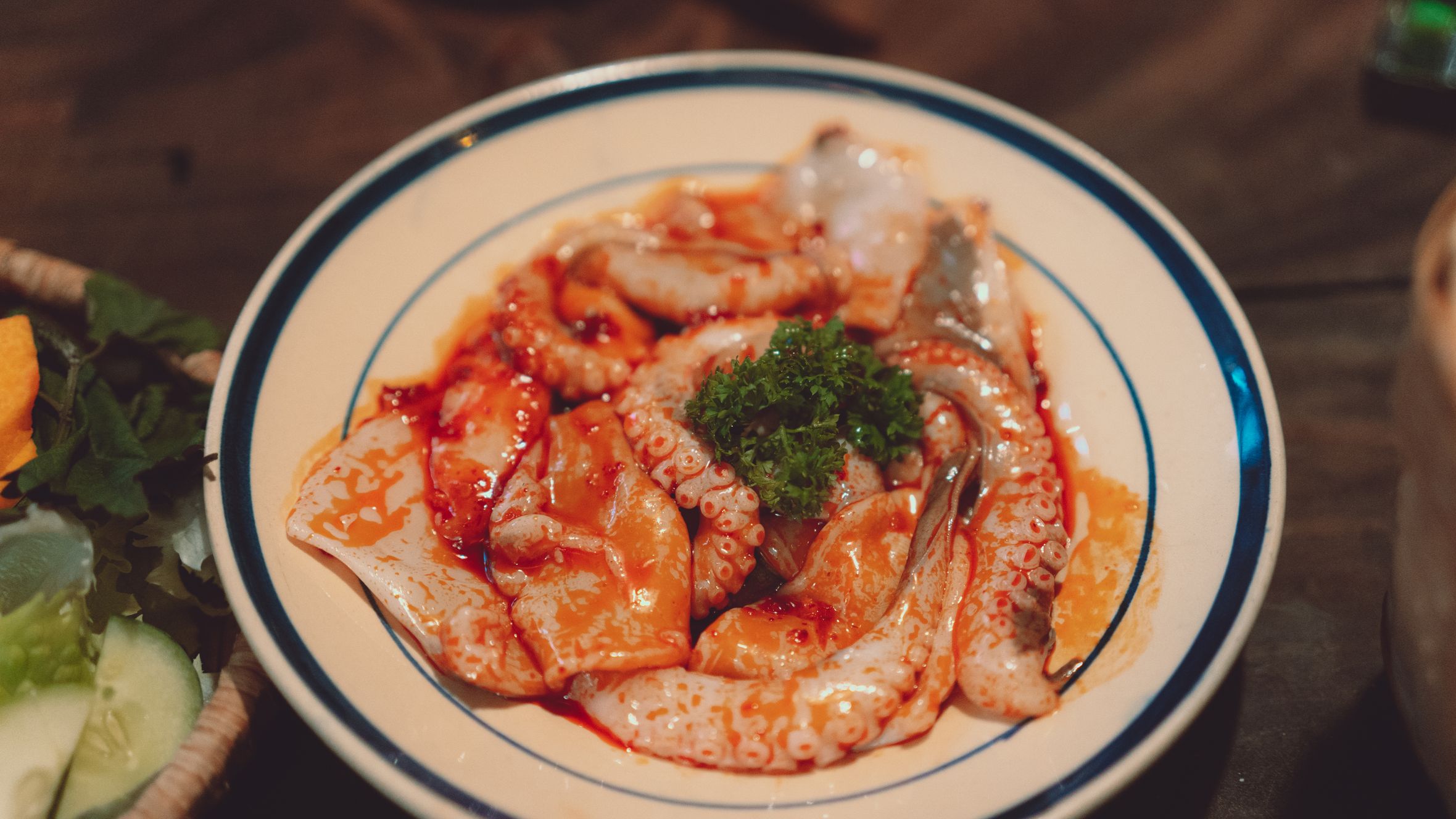 Close-up of a deliciously plated seafood dish featuring octopus in Dalat, Vietnam.