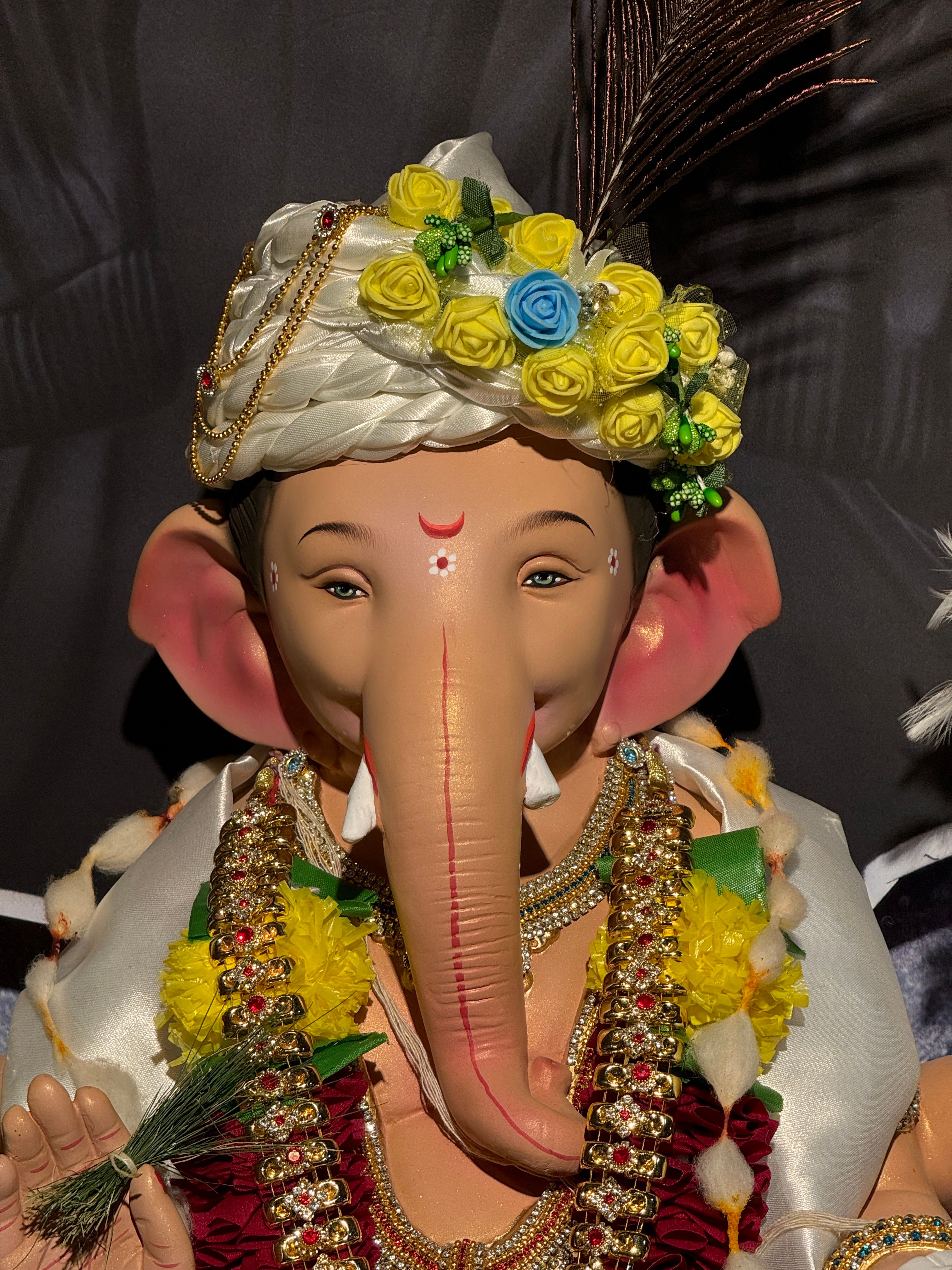 Closeup of a beautifully decorated Ganesh idol for Ganesh Chaturthi festival.