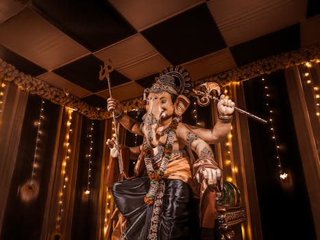 Ganesh idol adorned with lights during Ganesh Chaturthi festival in Mumbai, India.