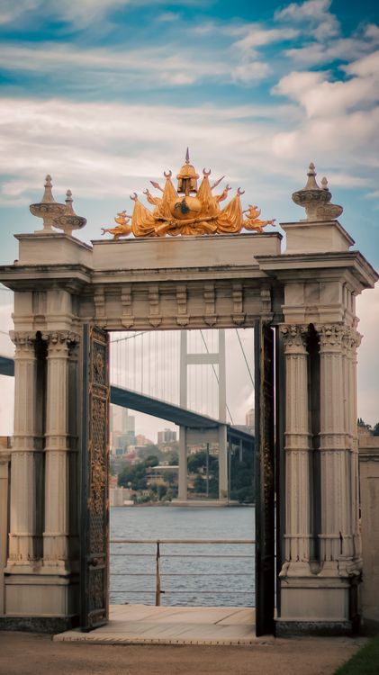 Bridge Gate Background A gate with a bridge in the background · Free Stock Photo