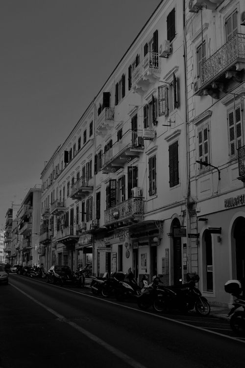 Free Vintage architecture and street life captured in an urban European town. Stock Photo