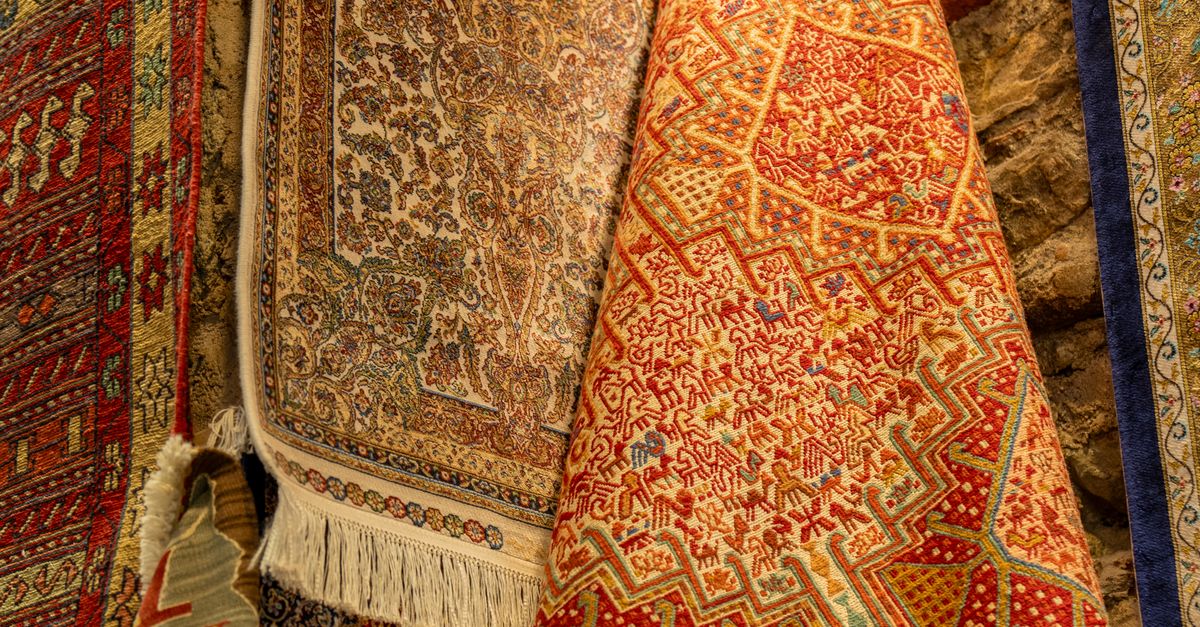 Market Rug Rugs Hanging in a Market · Free Stock Photo