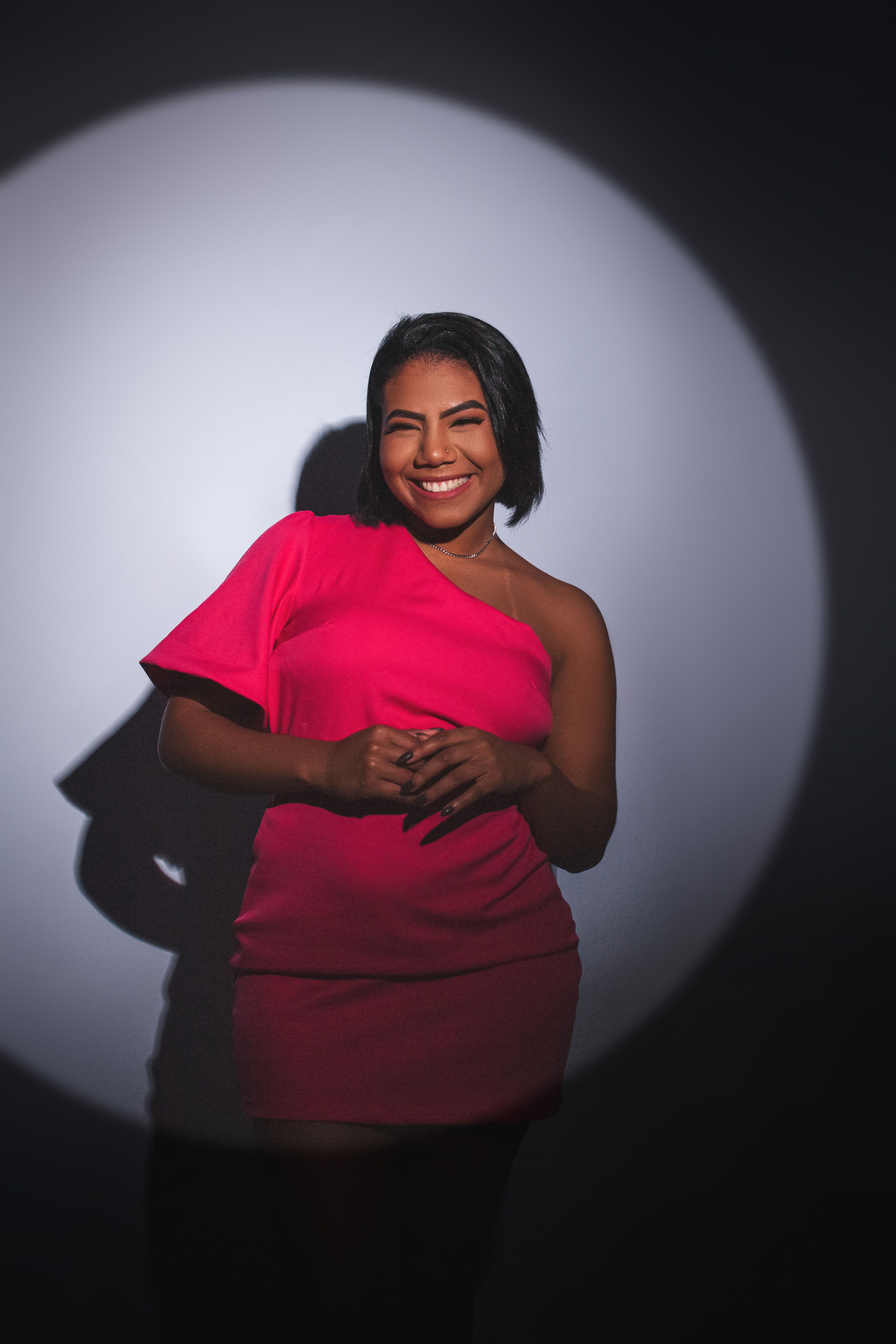 Portrait of a Woman in a Pink Dress · Free Stock Photo