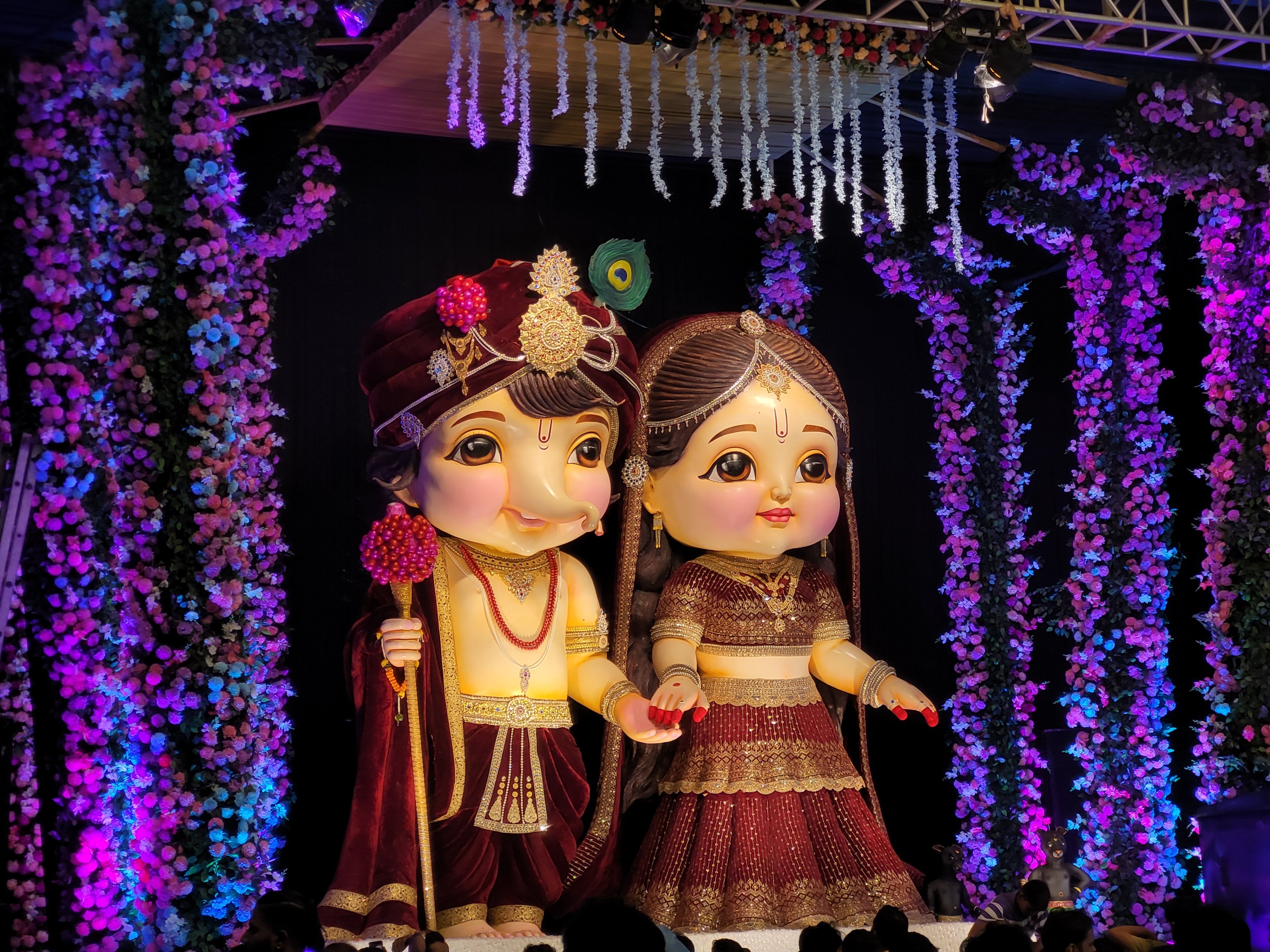 Vibrant festival decoration with traditional Indian dolls in Raipur, India.