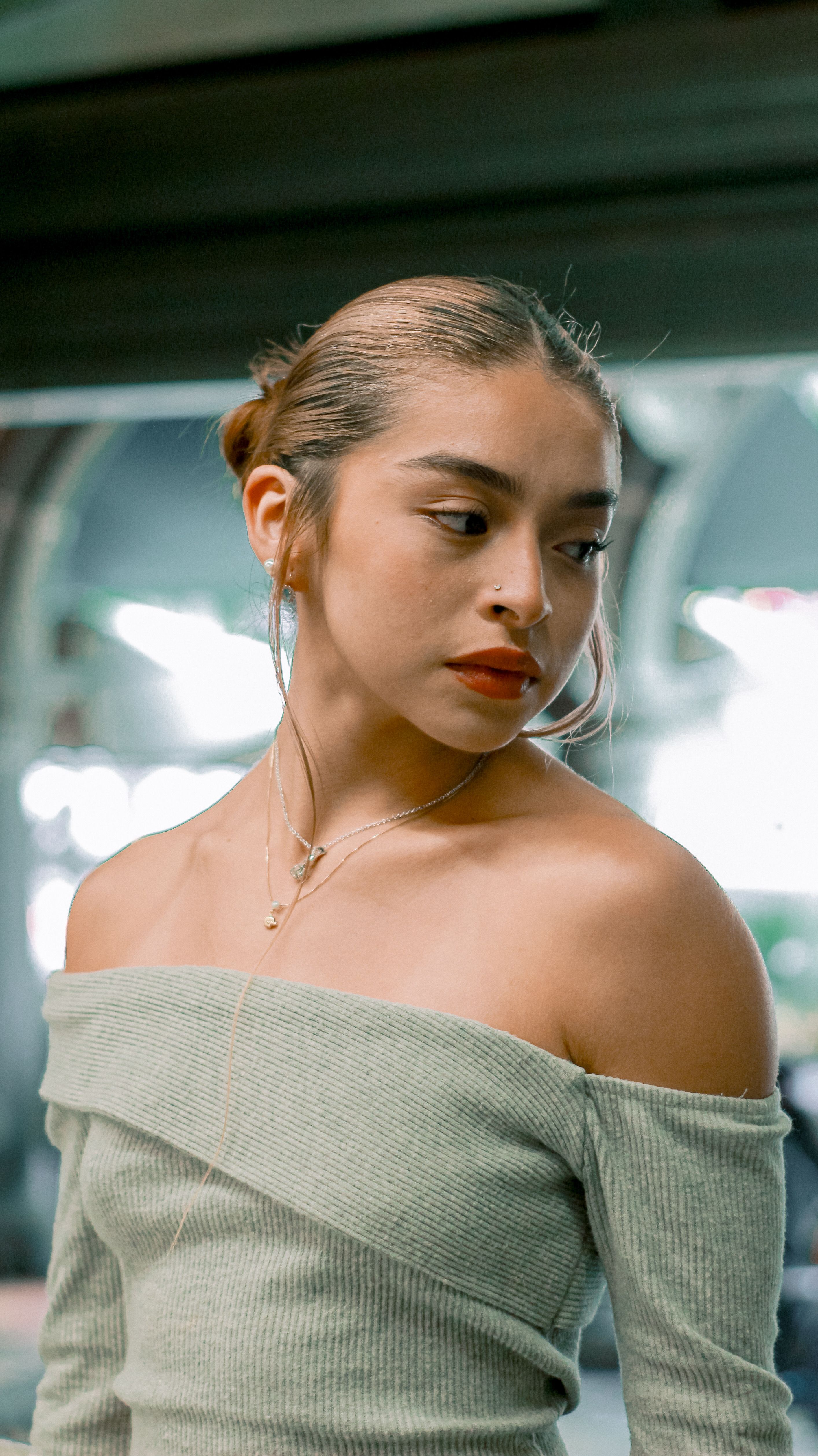 Portrait of a Stylish Young Woman in Urban Setting · Free Stock Photo