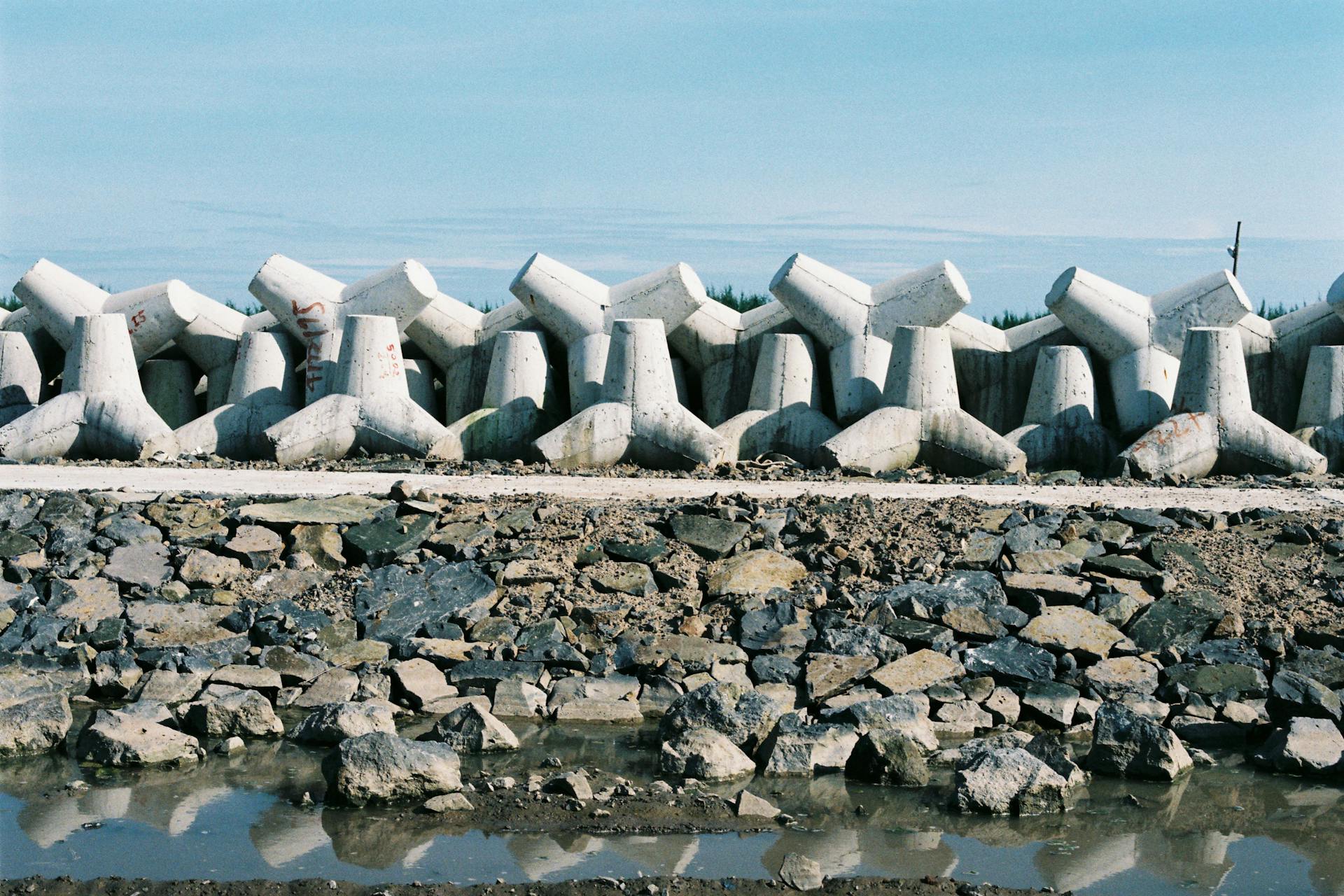 Concrete tetrapods line the shore for coastal protection in Vietnam.