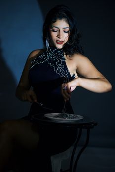 Portrait of a glamorous woman in a studio setting, showcasing elegant fashion and cinematic lighting.