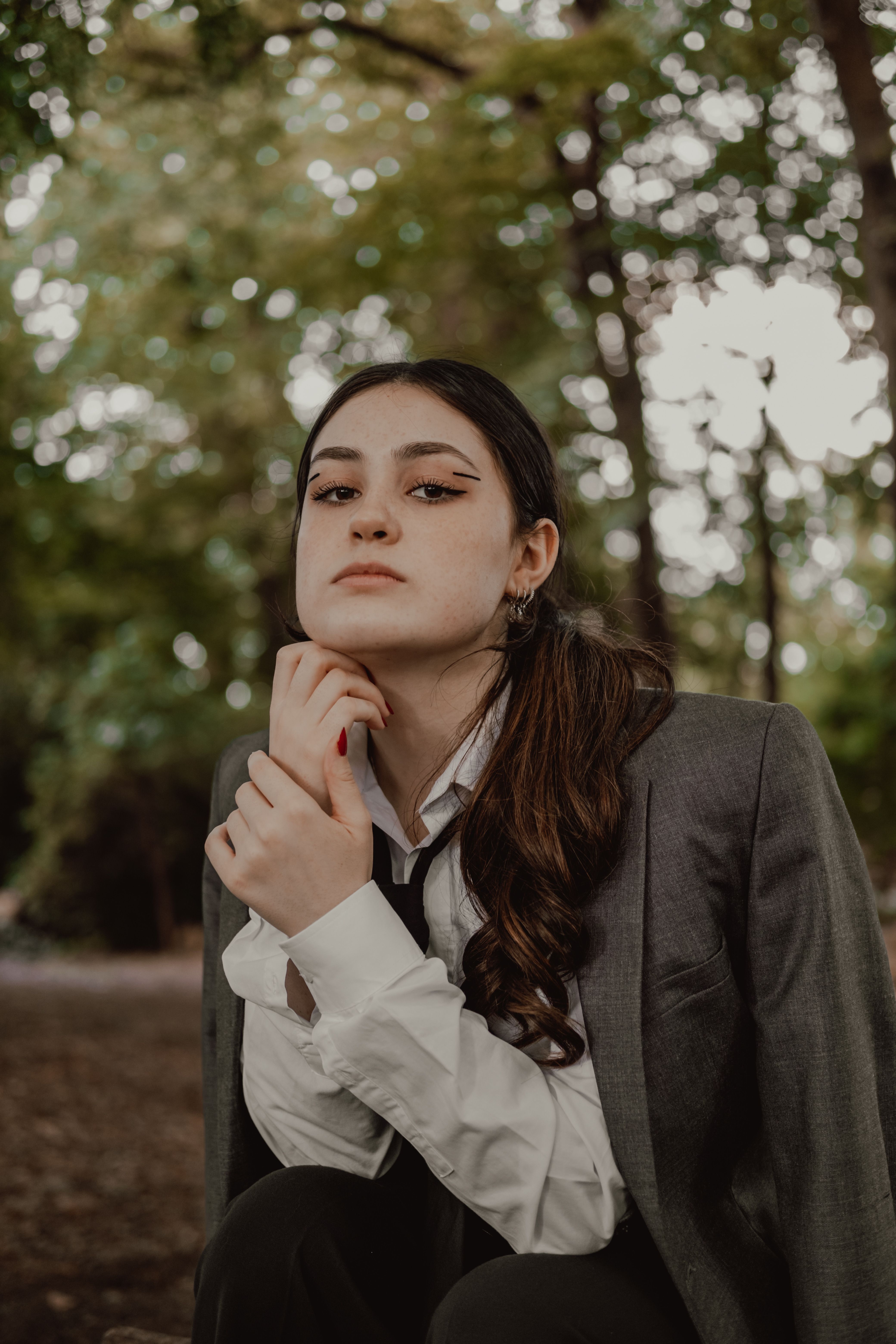 Elegant Woman in White Blouse and Blazer · Free Stock Photo