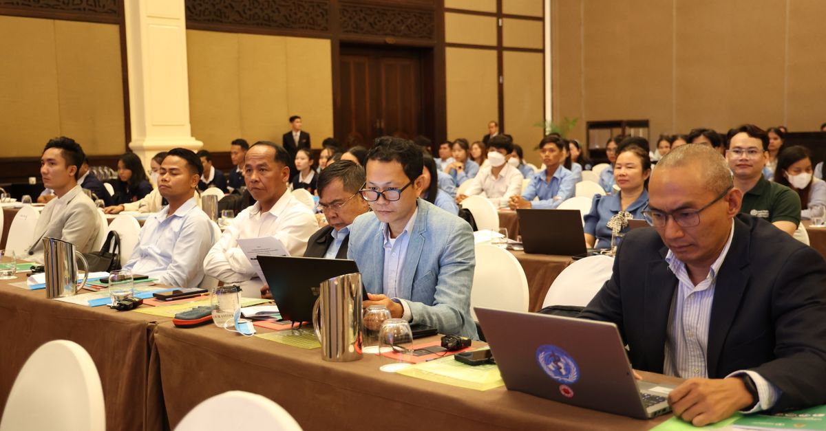 Participants attend a business conference in Phnom Penh, focusing on innovations and networking.