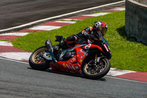 Free Exciting motorcycle racing scene at Batangas Circuit, Philippines. Stock Photo