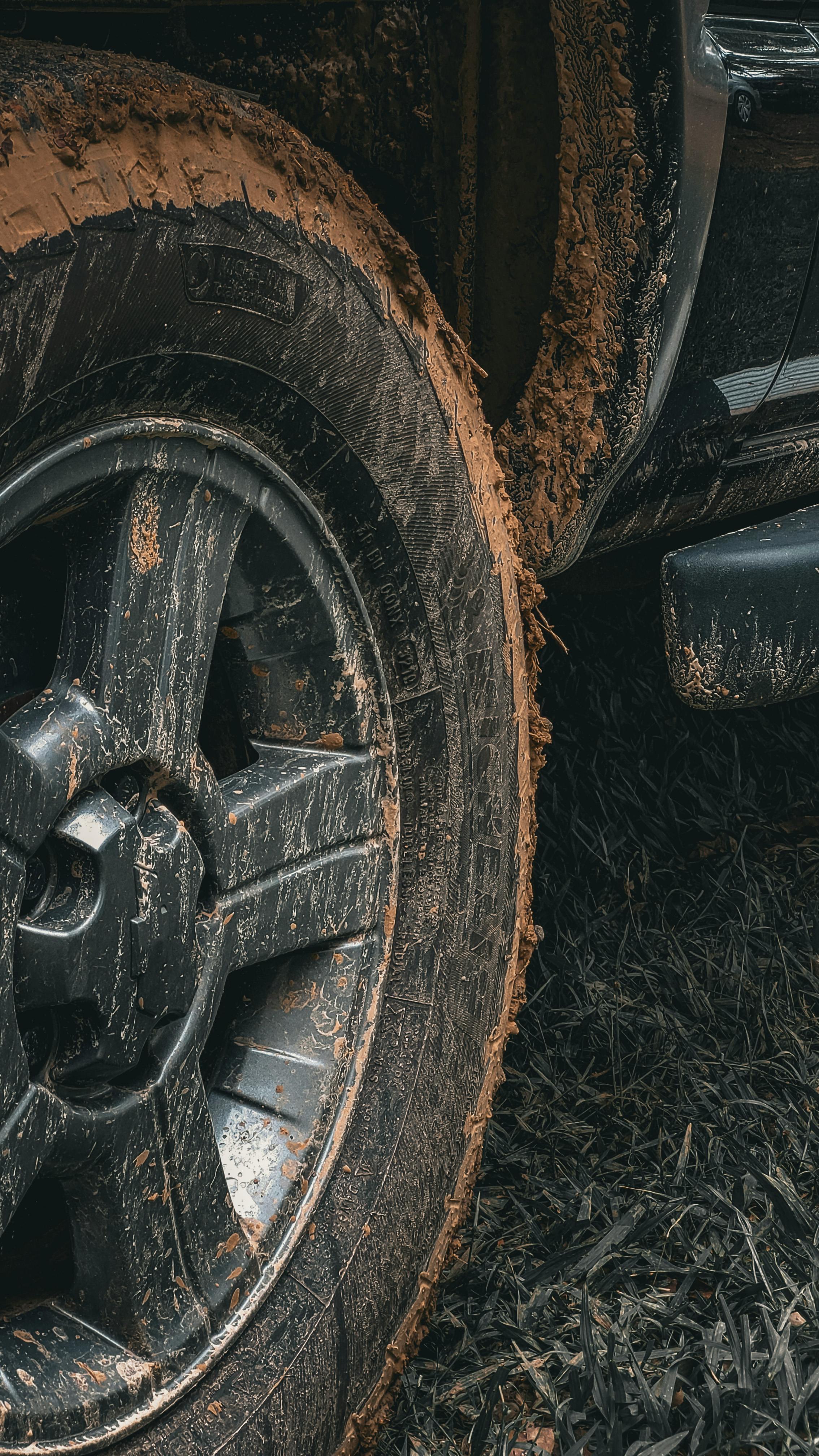 a tire on a truck in the mud