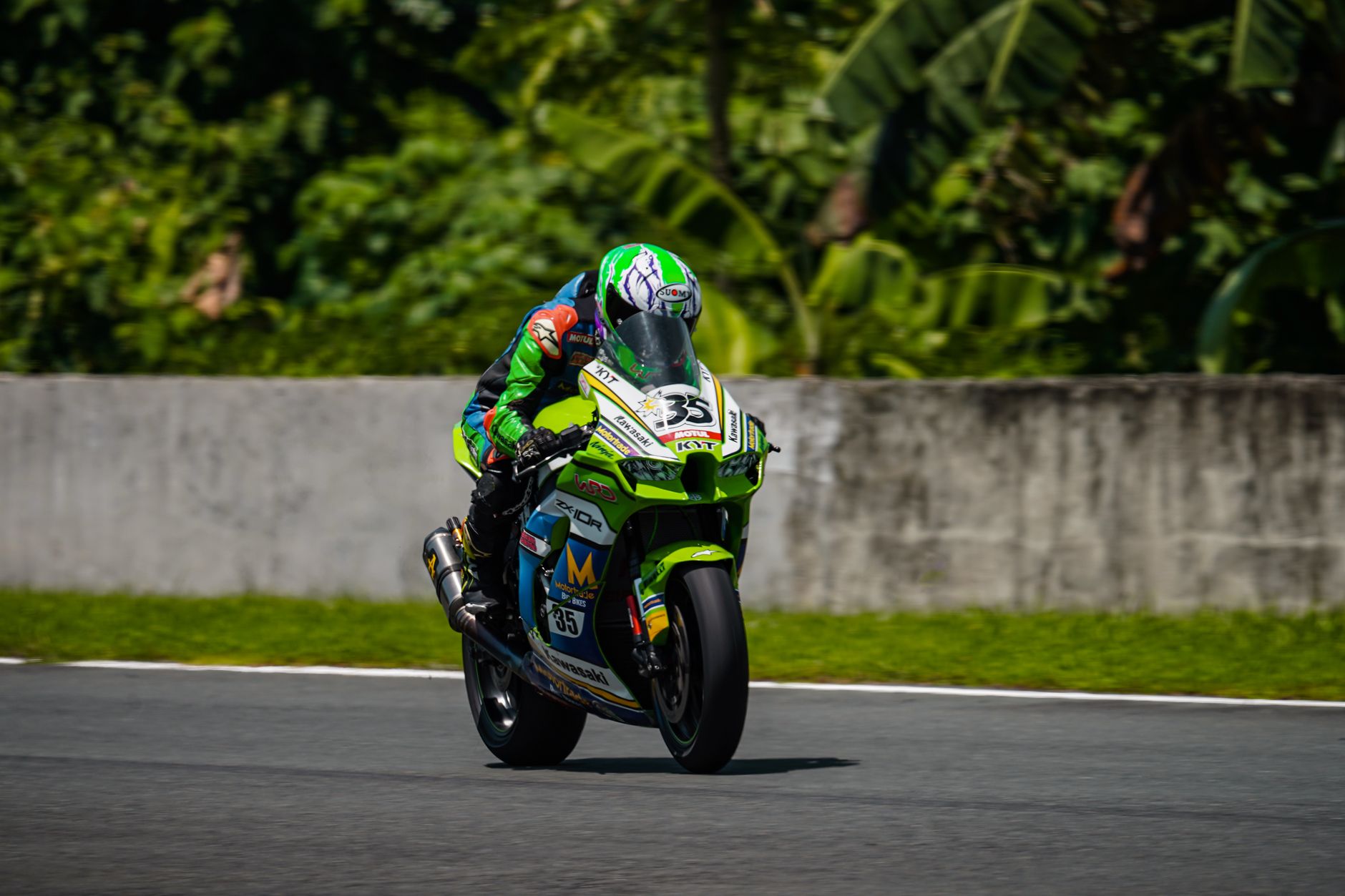 A thrilling moment of a motorcycle racer speeding on a track in Batangas, Philippines.