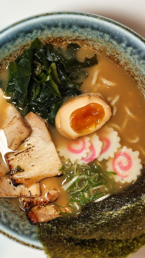 Free A delicious bowl of traditional Japanese ramen with rich toppings and flavorful broth. Stock Photo