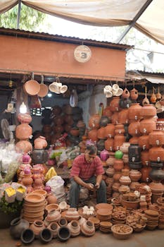 A vibrant pottery market stall showcasing an array of traditional clay pots and earthenware.