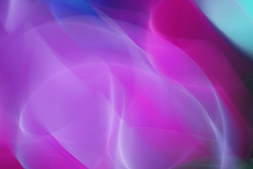 Free A visually striking abstract with vibrant purples and pinks, showcasing smooth, flowing light waves. Stock Photo