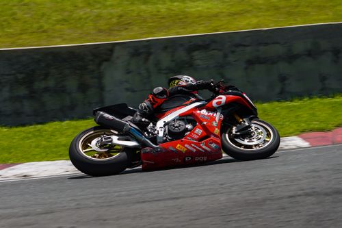 Free High-speed motorcycle race action shot on a circuit in Batangas, Philippines. Stock Photo