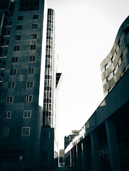 A stunning view of modern skyscrapers and urban architecture with reflective glass surfaces.