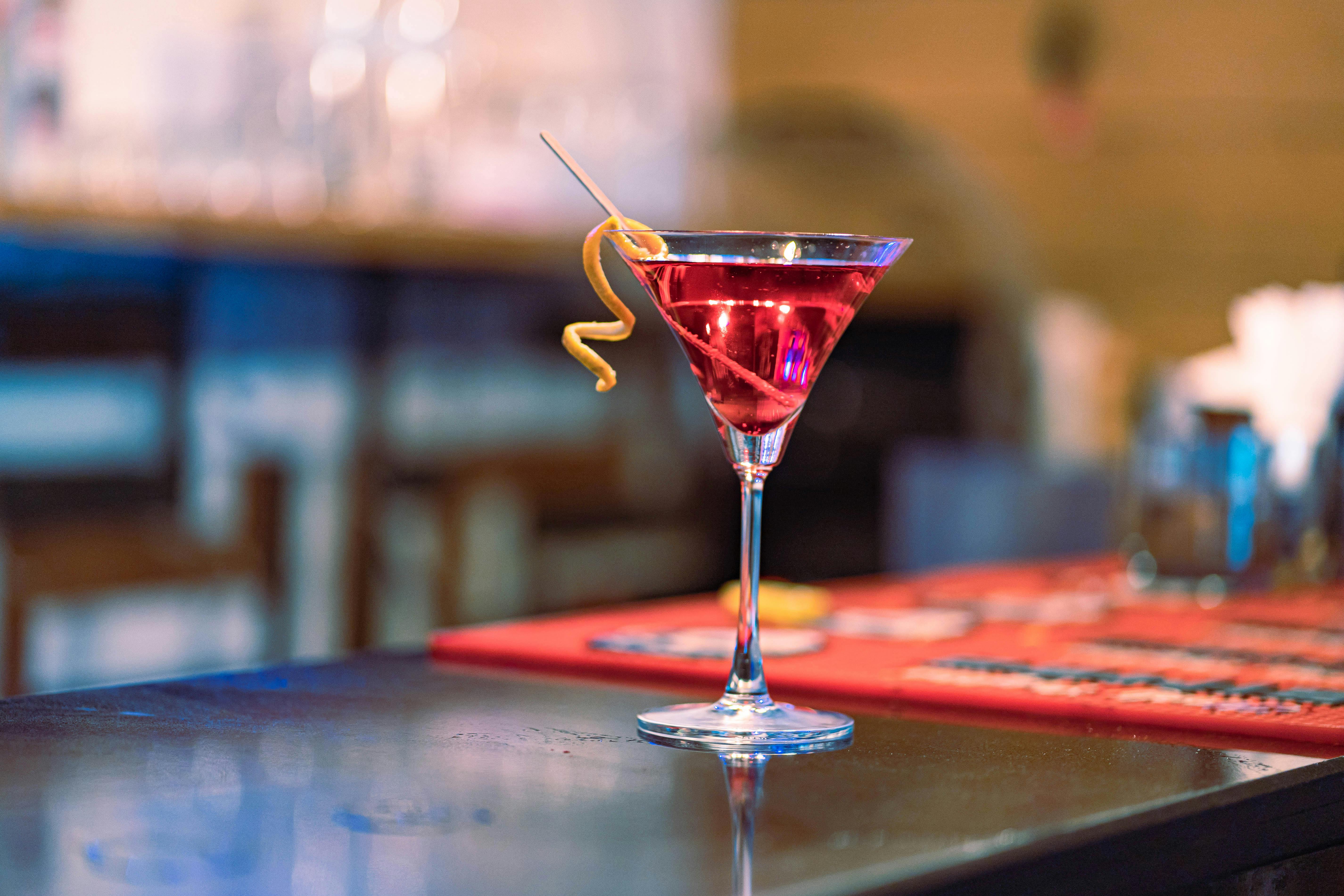 finished vodka martini on a bar top - how to make a vodka martini