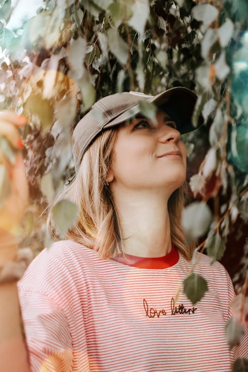 Woman Wearing Cap And Red Striped Shirt