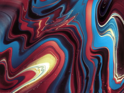 Free A mesmerizing abstract fluid art piece featuring vibrant blue, red, and yellow swirls in a dynamic composition. Stock Photo