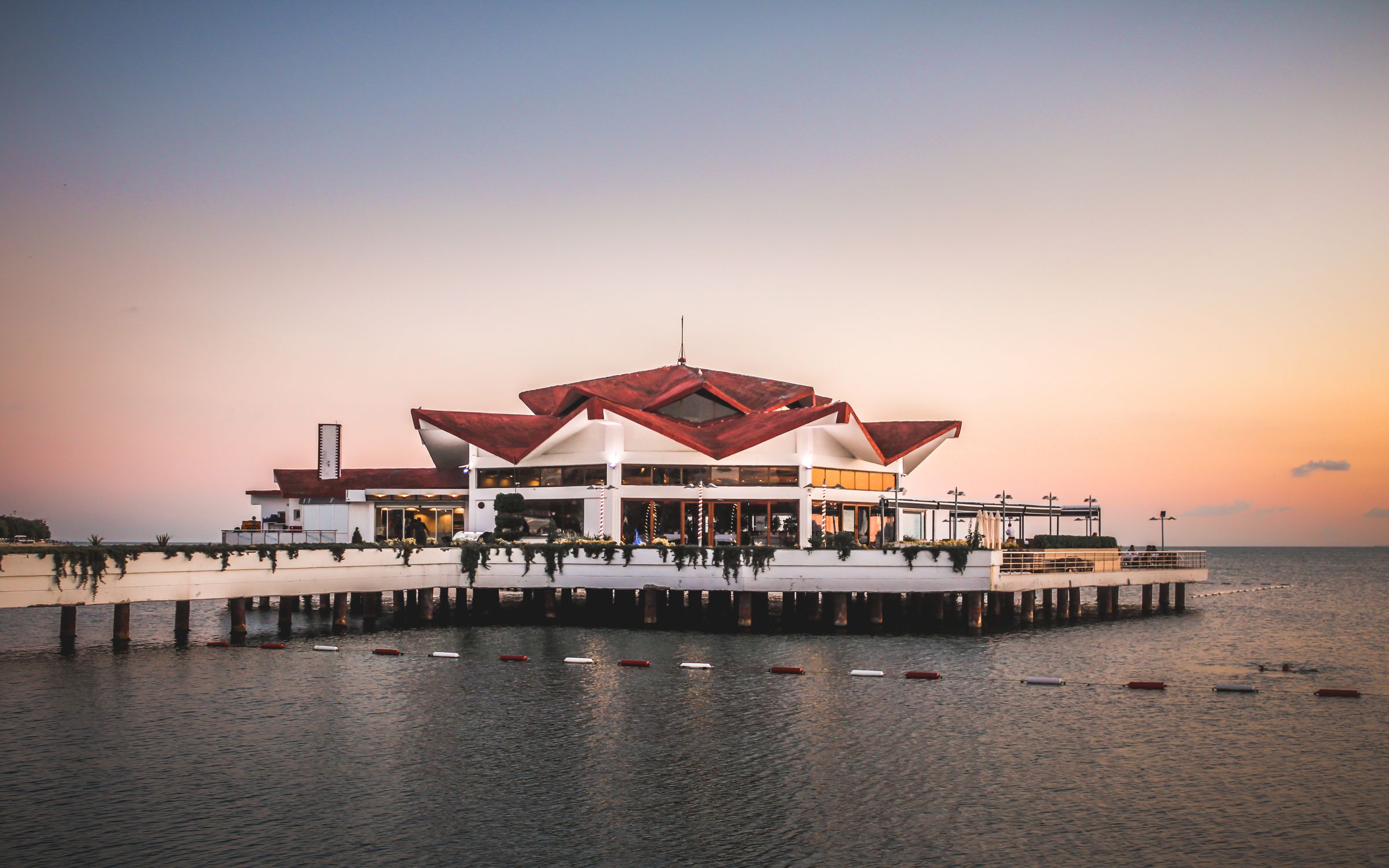 An Octagonal Shaped Building Built Above Water · Free Stock Photo