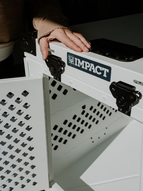 Free Close-up of a premium dog crate with ventilation, showcasing durable design and utility. Stock Photo