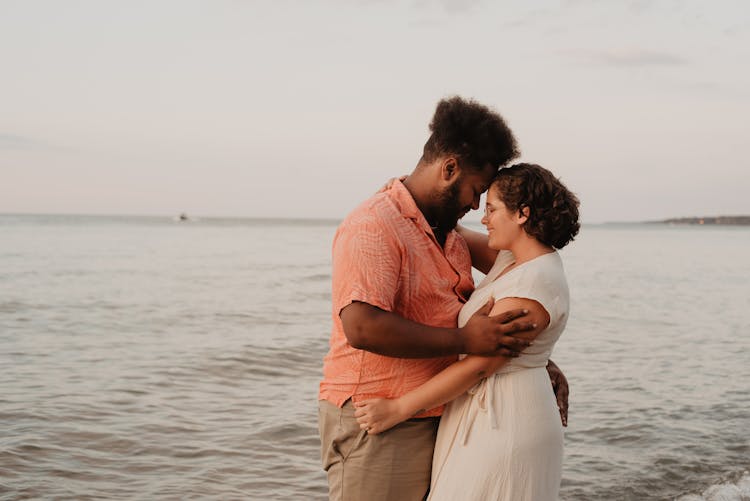 Man And Woman Near Sea