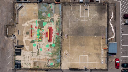 Aerial Photography of Two Concrete Open Courts