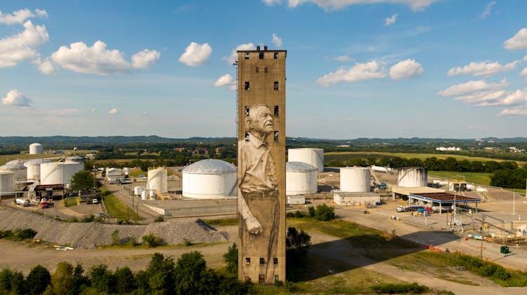  Concrete Building With Mural On An Industrial Plant