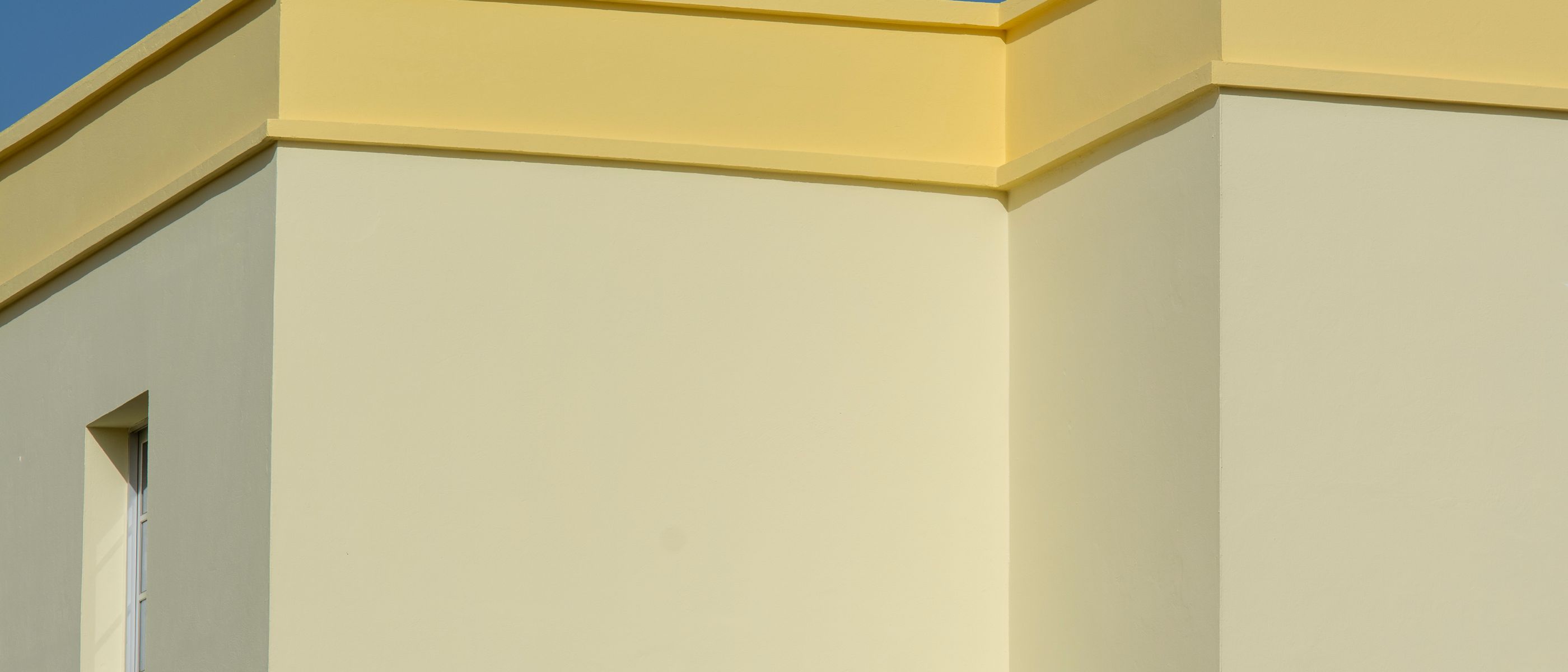 Masonry and Render Painting in Wennington — careful masking before painting begins
