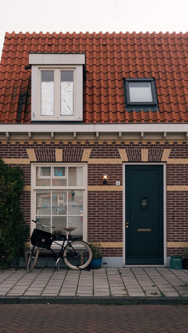 Gratis stockfoto met Amsterdam, architectuur, bakstenen huis