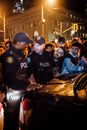Police Men With A Group Of People In A Rally