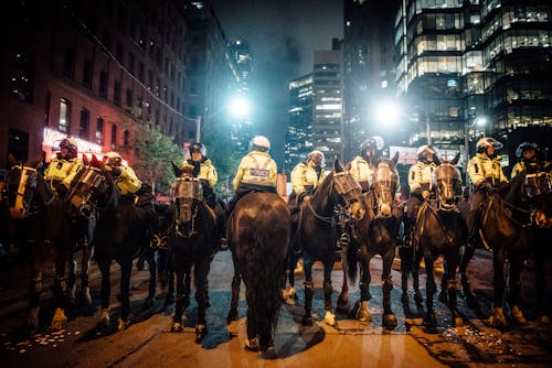 Free Group of Policemen on Horse Stock Photo