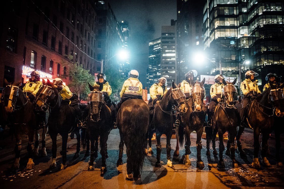 Photo of a group of police on horses