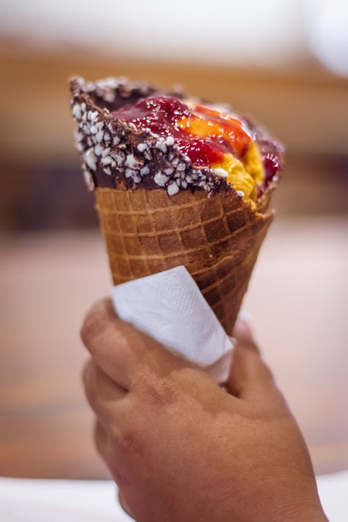 Close-Up Photo Of Person Holding Ice Cream 