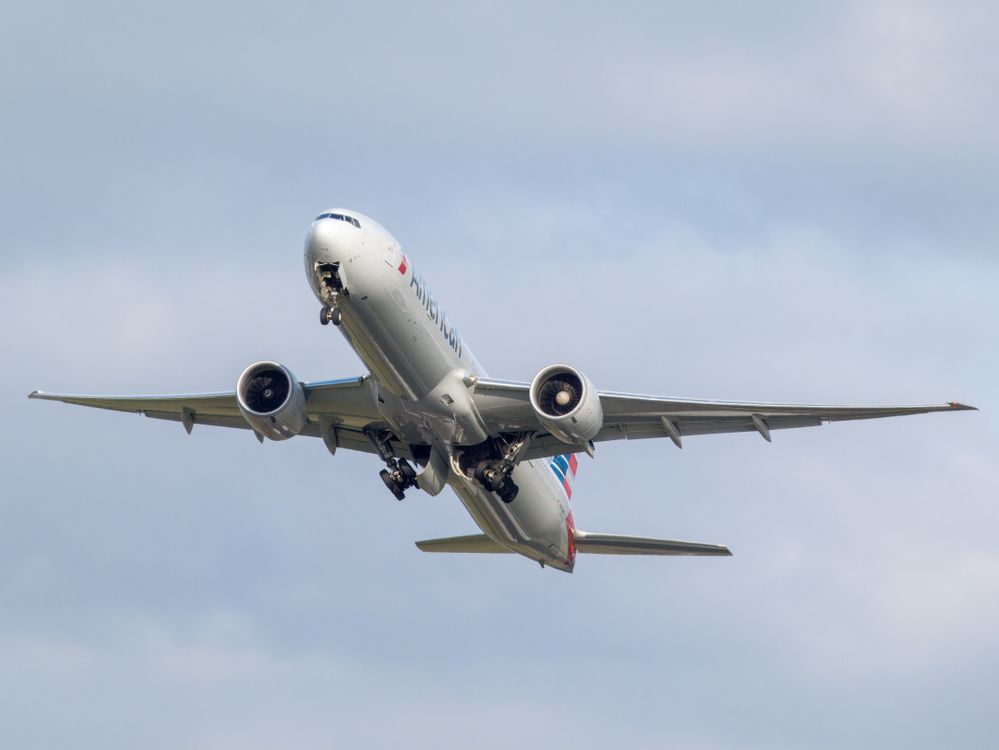 Plabe Rising Commercial Airplane in Flight on a Clear Day · Free Stock Photo
