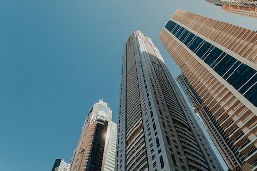 A breathtaking upward view of modern skyscrapers in Dubai's urban architecture.