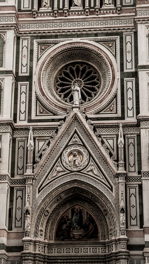 Free Close-up of Florence Cathedral's ornate facade showcasing intricate Gothic design. Stock Photo