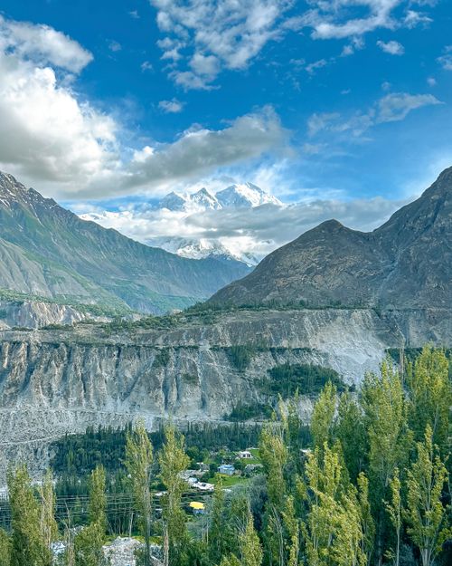 Free A stunning panorama of mountains and valleys under a bright blue sky in Hunza, Pakistan. Stock Photo