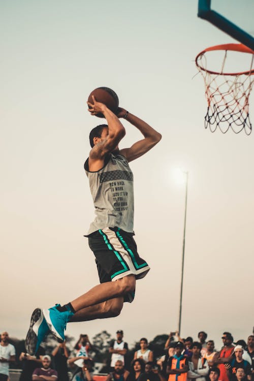 Photo Of Man Doing Dunk