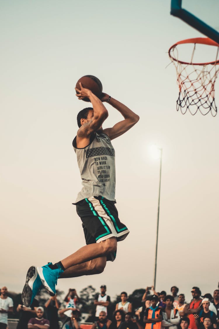 Photo Of Man Doing Dunk