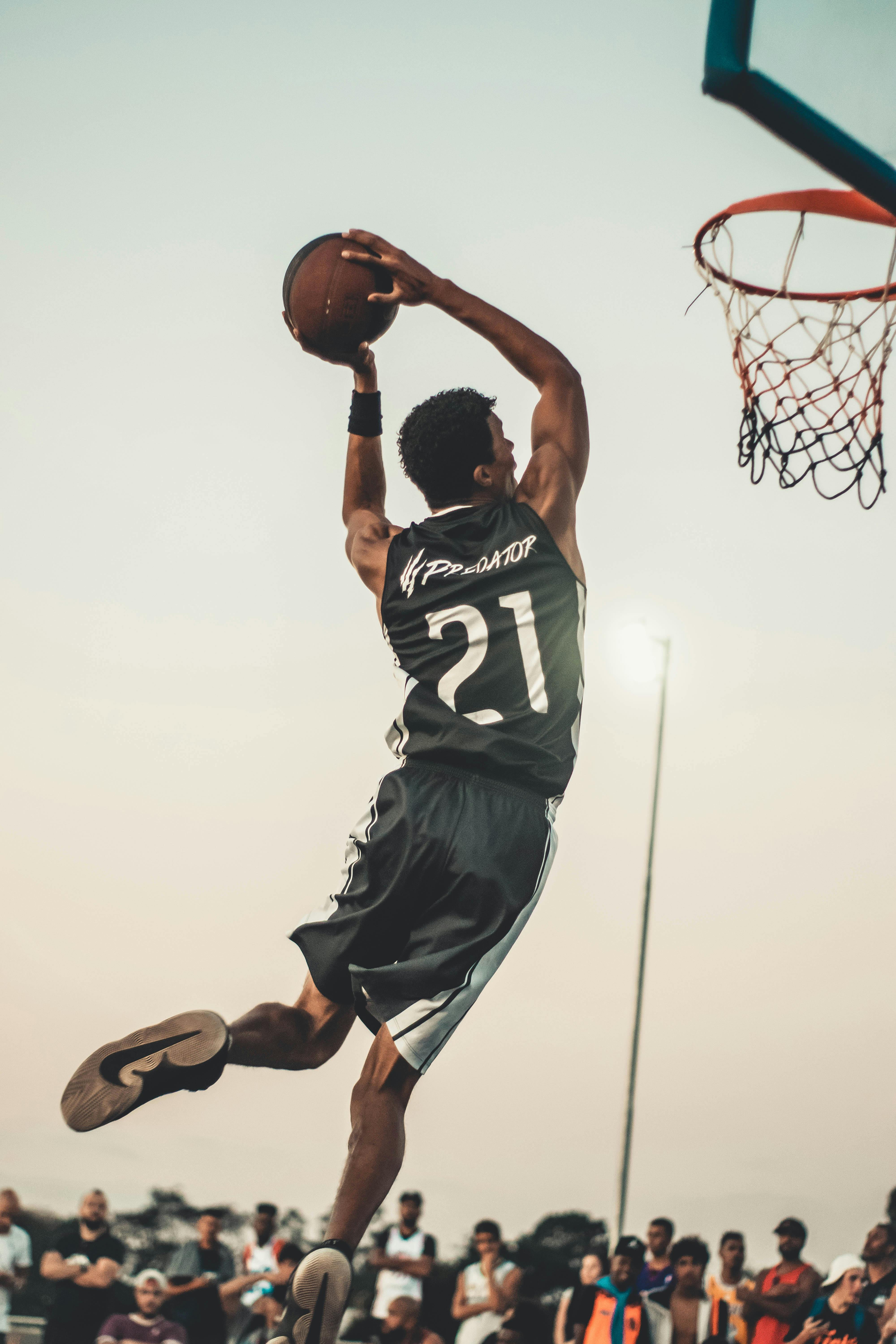 Photo Of Man Doing Dunk · Free Stock Photo