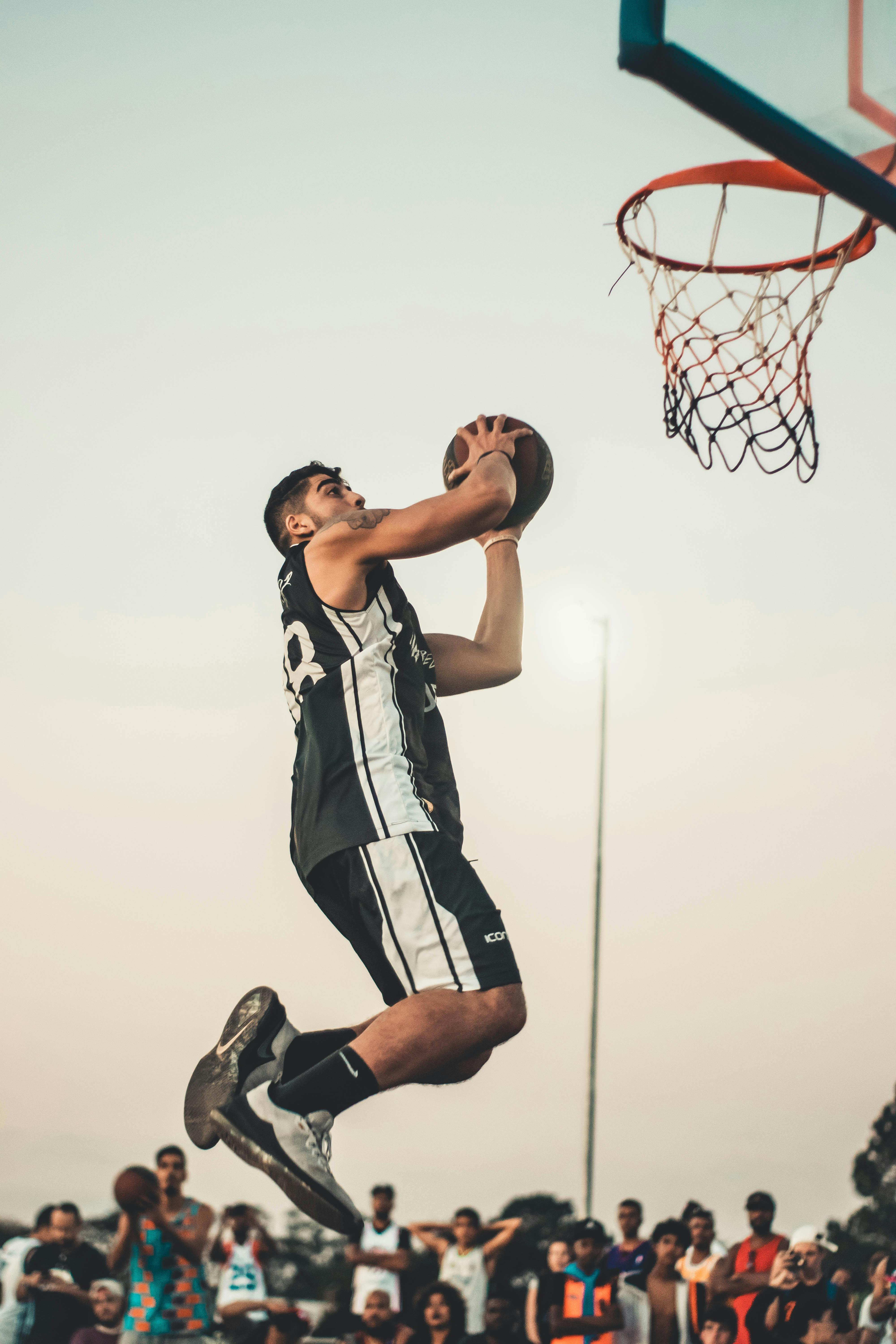 photo of man doing dunk