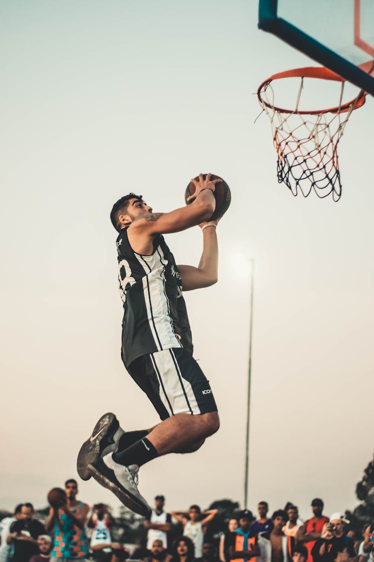 Photo Of Man Doing Dunk