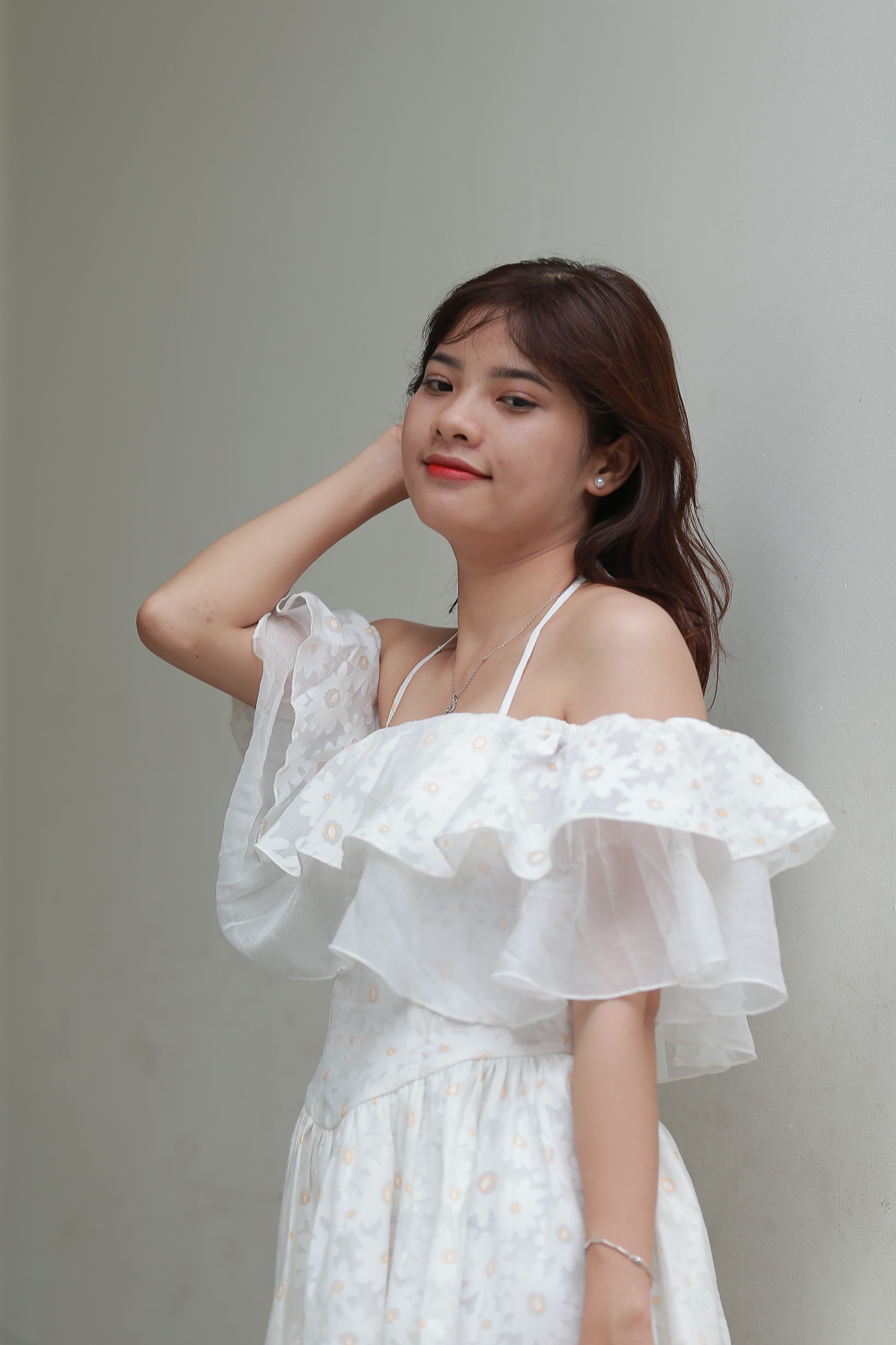 A woman in white dress posing for a photo · Free Stock Photo