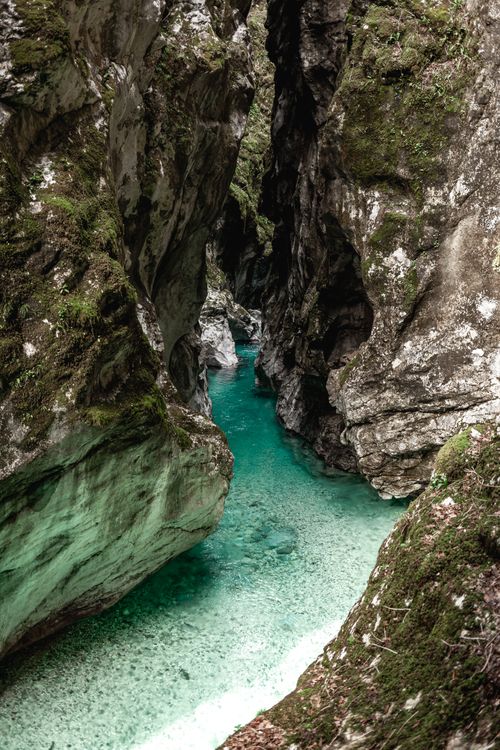 Free A breathtaking view of a turquoise river flowing through a rocky canyon, showcasing nature's beauty. Stock Photo