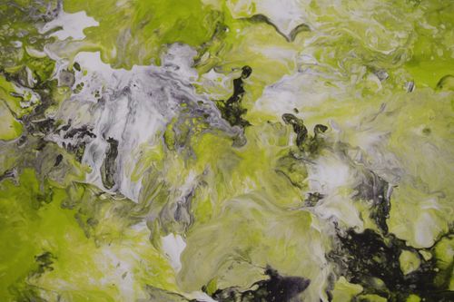Free Dynamic abstract art featuring fluid swirls of green, white, and black, showcasing a vibrant and energetic design. Stock Photo