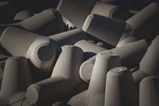 A pile of concrete blocks with a black background