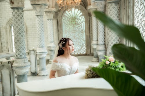 Photo Of Woman Near Piano