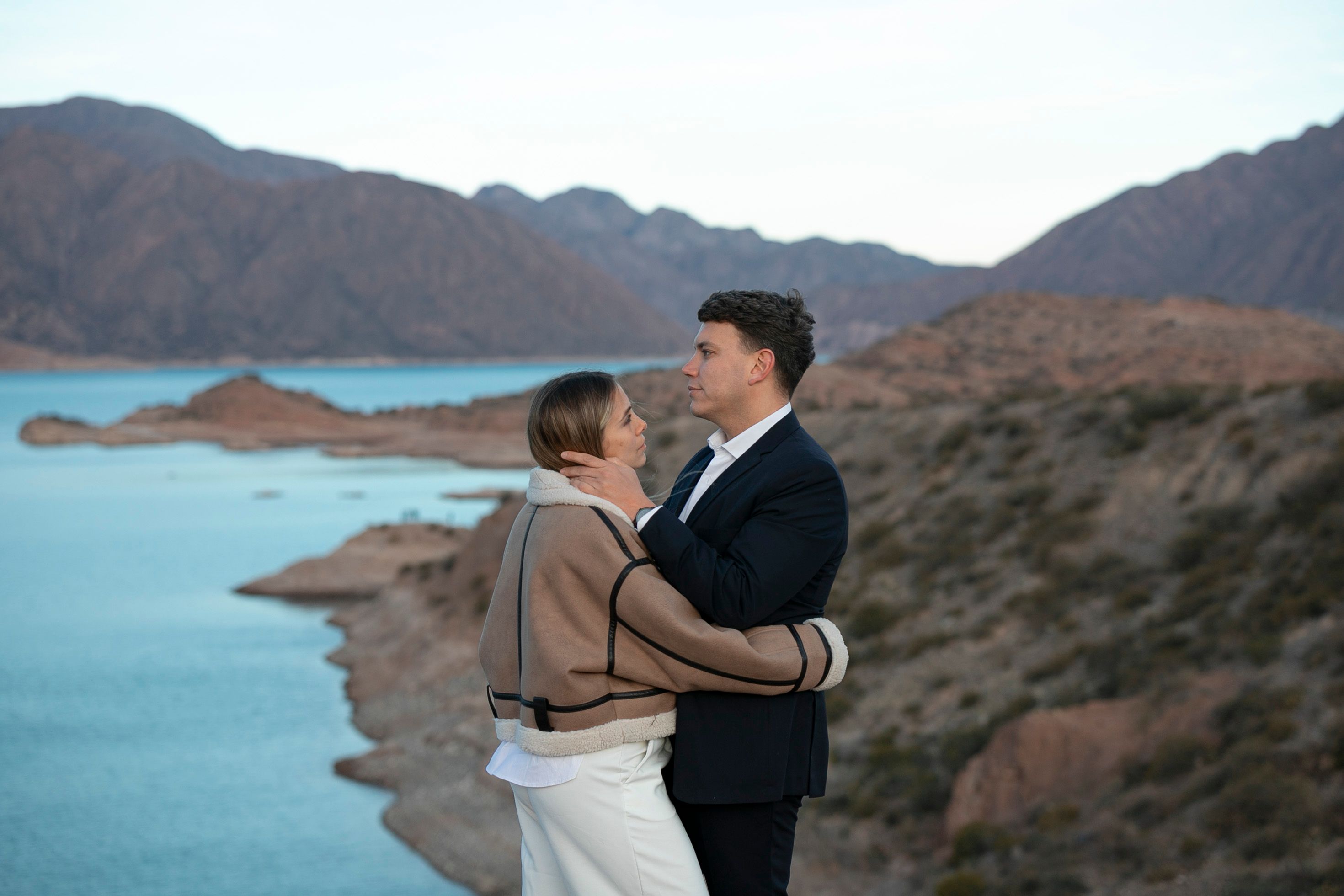 Fernando Mendoza, Jeremiyah Love, and Ty Simpson rookie cards displayed under a bright collector’s magnifying lamp